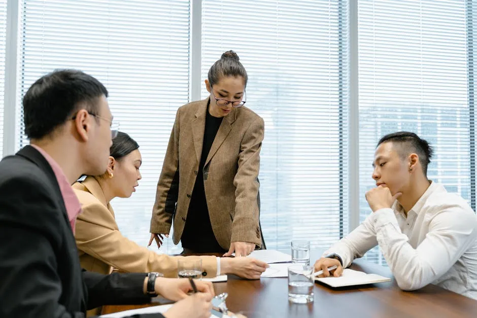 A professional pausing for a deep breath outside a Singapore meeting room — calm posture, papers in hand, gathering composure before walking in